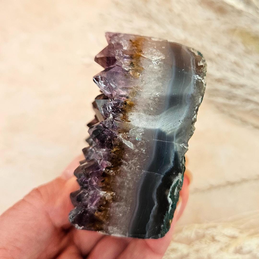 Amethyst heart cluster on stand