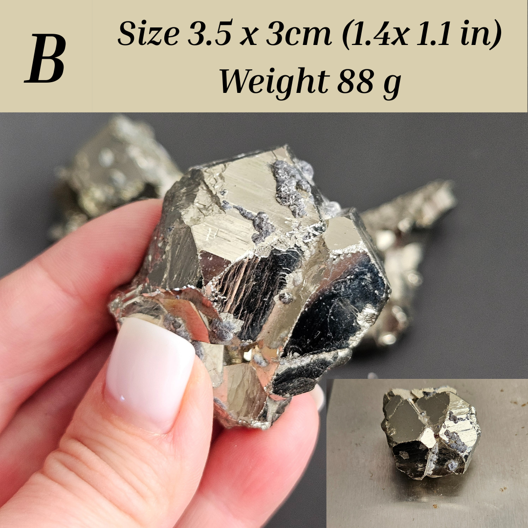 Close-up of natural pyrite cluster showing geometric cubic patterns, decorative healing crystal for prosperity