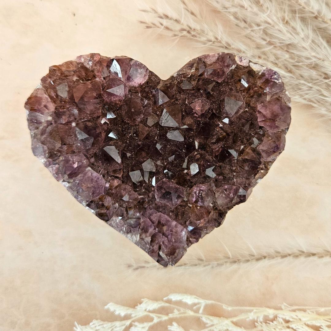 Amethyst heart cluster on stand