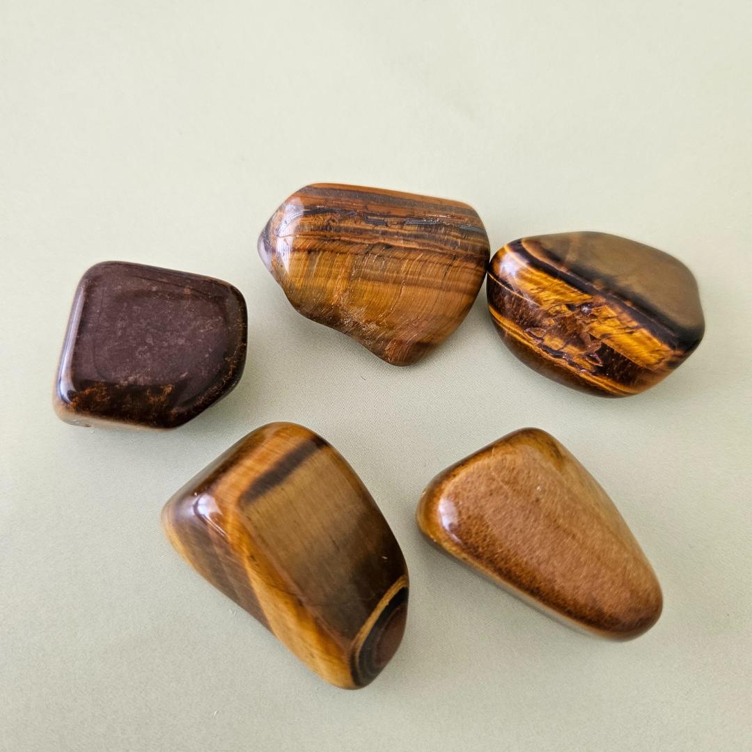 Tigers eye tumbled stone brown gold crystal protection focus confidenc