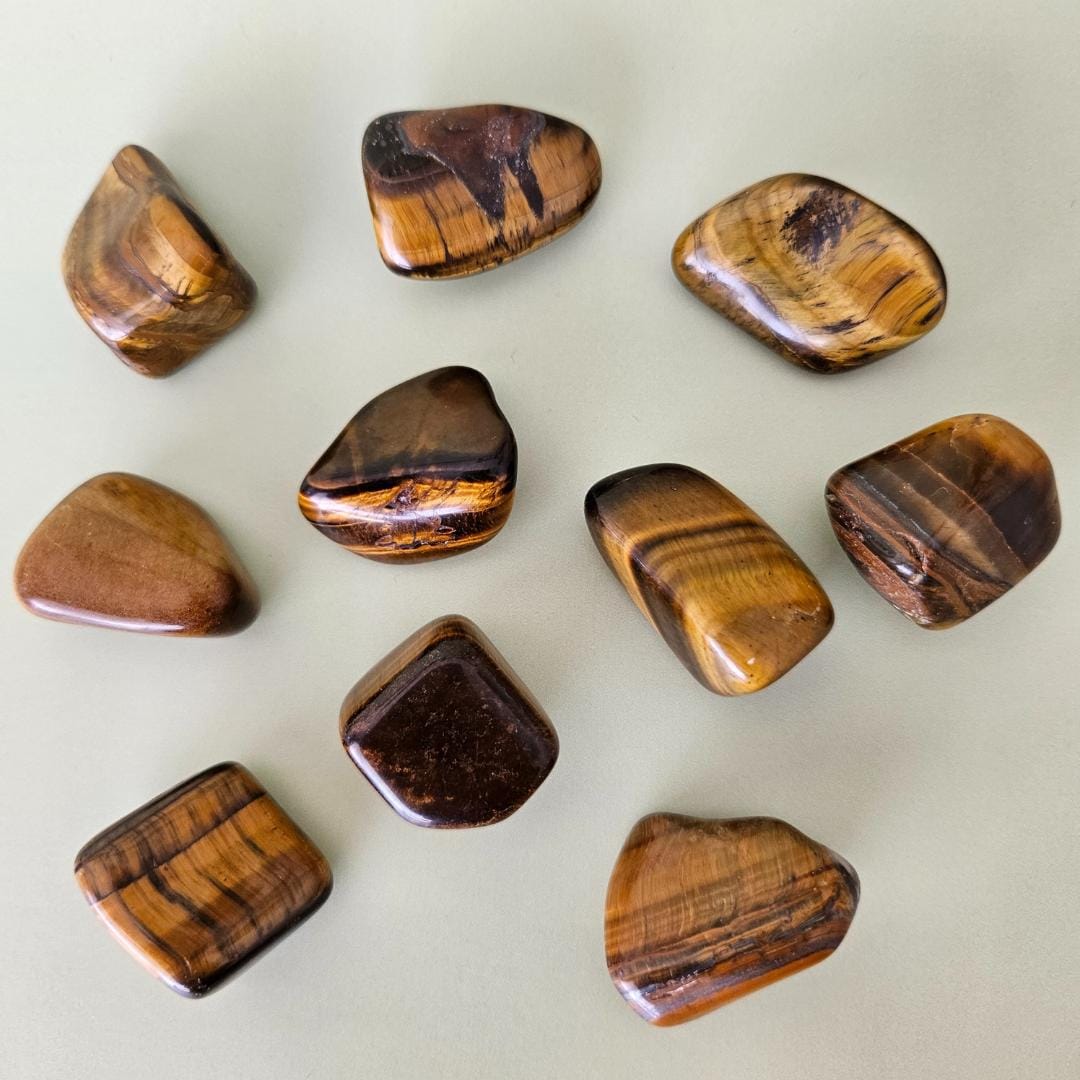 Tigers eye tumbled stone brown gold crystal protection focus confidenc