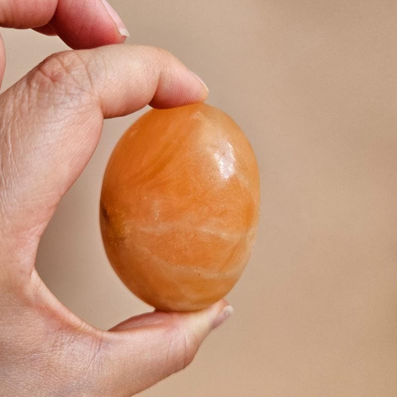 Orange Calcite Palm Stone from Madagascar High Vibe Joy
